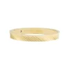 Bague Harlow à texture linéaire en acier inoxydable doré Bague Harlow à texture linéaire en acier inoxydable doré