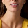 Boucles d&rsquo;oreilles créoles Ellis en laiton doré aux formes variées