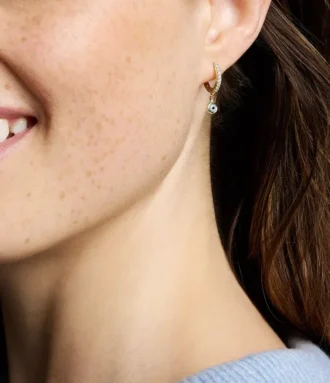 Boucles d&rsquo;oreilles créoles en laiton Sutton Evil Eye