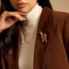 Broche serpent en acier inoxydable doré