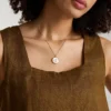 Collier pendentif en acier inoxydable doré et nacre blanche Gemini Sutton Zodiac