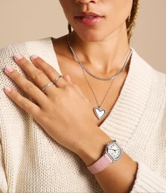 Collier Sutton Legacy Heart avec pendentif rotatif en acier inoxydable