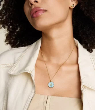 Collier Sutton Zodiac en acier inoxydable doré avec pendentif en nacre verte