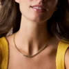 Collier tennis Sutton Love-All en laiton doré avec maillons en forme de cœur Collier tennis Sutton Love-All en laiton doré avec maillons en forme de cœur