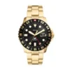 Montre Fossil Blue GMT en acier inoxydable doré Montre Fossil Blue GMT en acier inoxydable doré