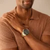 Montre Fossil Blue GMT en acier inoxydable doré Montre Fossil Blue GMT en acier inoxydable doré