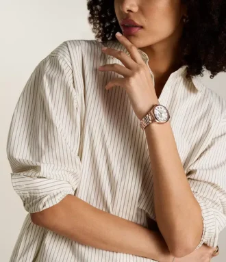 Montre Gilmore à trois aiguilles avec date, en acier inoxydable doré rose