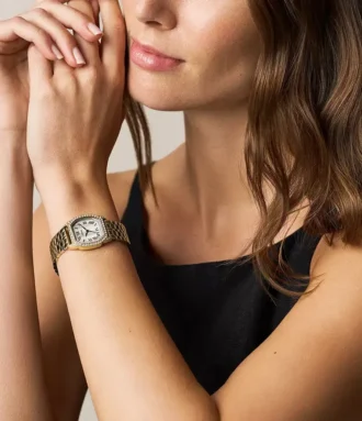 Montre Harlow à trois aiguilles en acier inoxydable doré