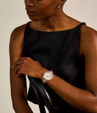 Montre multifonction Riley en cuir couleur or rose et sable Montre multifonction Riley en cuir couleur or rose et sable