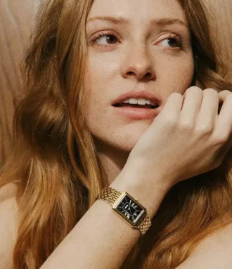 Montre Raquel à trois aiguilles avec date, en acier inoxydable doré